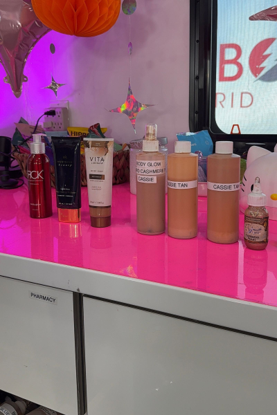 A counter full of bottles of body makeup in the Euphoria makeup trailer for season 3.